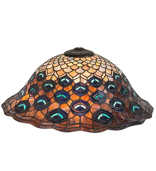 This Peacock Feather design is a favorite Tiffany pattern. Mauve with Beige; Pink; Orange & Gray art glass adorn the bottom of the shade while feathers feature Turquoise Blue and Purple. A scalloped crest featuring Purple; Blue; Orange and Green edges a ring of plumage of the undulating shade; created using the Meyda Tiffany copperfoil construction. Pairs with a base to create a table or floor lamp or hardware for a ceiling or wall fixture. The Peacock Feather Shade is featured in our American designed; handcrafted Tiffany Reproduction Stained Glass Lighting Collection. Each is a unique work of art with color variations based on natural ingredients inherent in the glass. Contact us if color matching is critical when ordering multiple items. - alternate view