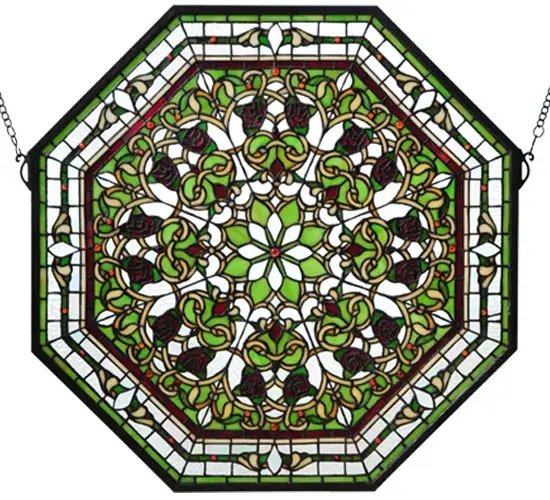A magnificent octagon shaped stained glass window features various symmetric design repeats that branch out from a Leafy Green and Clear Beveled eight-petaled flower in the central medallion. Victorian styled floral motifs with Beige and Gold stems that grow among fanciful scrollwork on a Clear Wavy and Green background. The window is trimmed in borders of Amber, Burgundy, White, Clear Iridescent and Leafy Green glass. The window features an Antique Brass finished frame and includes hanging chains. Collection: Floral Finish: Zai Zav Avocado Burgundy Beige Glass: Zai Zav Av Br 59 Ba Width: 25.00" Height: 25.00" Length: 25.00" Weight: 8.00 lb Extension from Wall: 5.00" Number of Bulbs: 1 Bulb Type: TBD Bulb Base: T-10 Material: Metal Or Polyresin Country of Origin: CHINA Safety Listing: Dry Safety Rating: Dry - alternate view
