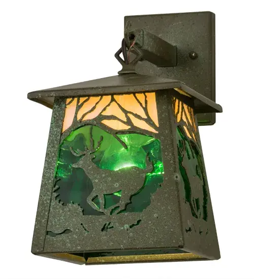 This nature inspired sconce depicts a Deer scampering among the enchanting forest against an Emerald Green Waterglass background; with a morning sky featured in Beige Iridescent art glass. The solid lantern is enhanced with decorative accents and a frame featured in a Tarnished Copper finish. The fixture is handcrafted in the Meyda facility at the foothills of the Adirondack Mountains in the USA. Custom designs; sizes; colors and dimmable energy efficient lamping options are available. UL and cUL listed for dry; damp and wet locations. - alternate view