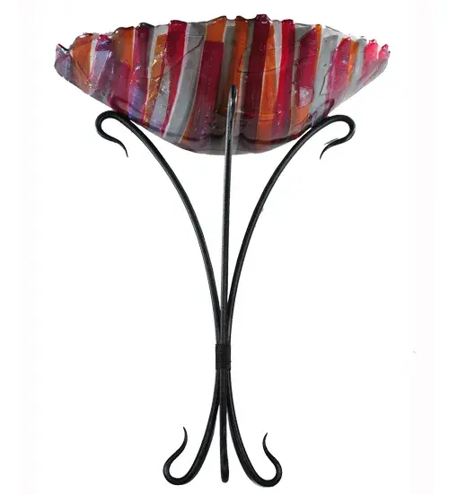 The Metro Fusion Lava Wall Sconce boasts a unique; cool look in hot glass. Hand-cut glass is high-fired to achieve a Red; Smoke; Amber; and Clear Iridescent Glass Lava shade; which is a striking look. The shade is enhanced with intricate Textured Black metal accents. The Metro Fusion Lava Wall Sconce is featured in our American-made; American-designed; handcrafted Fused Glass Lighting Collection. The fixture is UL and cUL listed for dry and damp locations. Each fixture is a unique work of art; with color variations based on the natural ingredients inherent in the glass. The Quality Bent Glass division of Meyda Tiffany Lighting is over 100 years in the making. Today; we are still creating timeless masterpieces using tools and methods from the days when we supplied Tiffany Studios. Fused glass colors and metal finishes are customizable; as each fixture is handcrafted to order. - alternate view