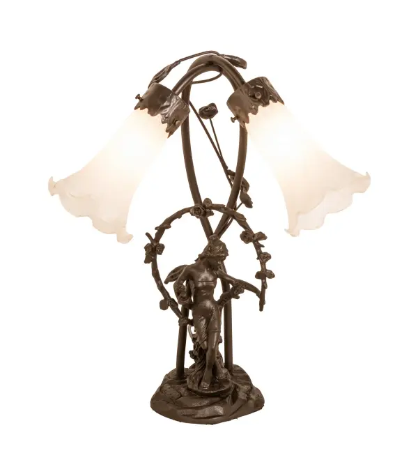 Inspired by Tiffany's famous Pond Lily design from the early 1900s... This table lamp is created with two mouth blown shades featuring White art glass. The Pond Lily shades are embraced by an elegant Cast Bronze Base featuring a girl under a trellis and finished in a rich Mahogany patina. The Pond Lily Table Lamp is featured in our American designed, handcrafted Favrile Lighting Collection. UL and cUL listed for dry locations. Each shade is a unique work of art with color variations based on natural ingredients inherent in the glass. Contact us if color matching is critical when ordering multiple items. Collection: White Finish: Mahogany Bronze Glass: White Width: 15.00" Height: 17.00" Length: 15.00" Weight: 8.00 lb Number of Bulbs: 2 Maximum Wattage: 15.00 W Bulb Type: B10 Bulb Base: E12 Material: Bronze Country of Origin: CHINA Safety Rating: Dry
