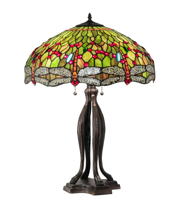 Inspired by a classic Dragonfly lighting masterpiece from Tiffany Studios. Scarlet Red dragonflies with glowing Red jeweled eyes and filigree topped Multicolored wings diving over a Green and Orange background. The stunning shade is accented with Red; Green and Blue jewels. The art glass shade is created using the famous Meyda Tiffany copperfoil construction. This base is featured in a warm hand applied Mahogany Bronze. UL and cUL listed for dry locations. Each shade is a unique work of art with color variations based on natural ingredients inherent in the glass. Contact us if color matching is critical when ordering multiple items.
