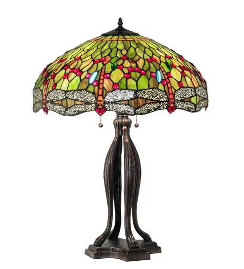 Inspired by a classic Dragonfly lighting masterpiece from Tiffany Studios. Scarlet Red dragonflies with glowing Red jeweled eyes and filigree topped Multicolored wings diving over a Green and Orange background. The stunning shade is accented with Red; Green and Blue jewels. The art glass shade is created using the famous Meyda Tiffany copperfoil construction. This base is featured in a warm hand applied Mahogany Bronze. UL and cUL listed for dry locations. Each shade is a unique work of art with color variations based on natural ingredients inherent in the glass. Contact us if color matching is critical when ordering multiple items. - alternate view
