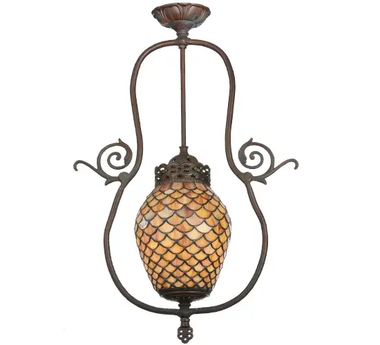 A Louis Comfort Tiffany studio classic... The renowned Fishscale design features a variegated Tortoiseshell of Emerald; Sapphire; Mauve; and Beige colored art glass; evoking a unique dimensional and textured look in a rainbow of brilliant hues. This exquisite art glass shade offers a unique Pineapple-formed profile and is created using the famous Meyda Tiffany copperfoil construction process. The ceiling pendant is enhanced with a unique curved frame with scrollwork featured in a Mahogany Bronze finish. This lighting design is perfect for homes in Northwest Montana; Eastern Idaho; and Baja; California. The overall height ranges from 28 to 60 inches; as the suspension rod can be adjusted in the factory to meet your precise lighting requirements. The pendant can perfectly illuminate living and dining spaces in residential and hospitality settings. The Tiffany Fishscale Pendant is included in our American-designed Tiffany Reproduction Lighting Collection. UL & cUL listed for dry and damp locations. Each shade is a unique work of art with color variations based on natural ingredients inherent in the glass.