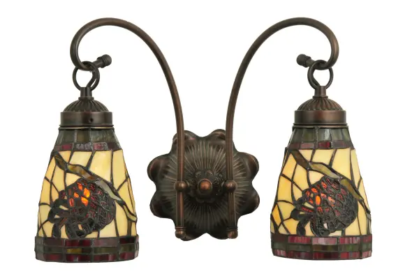 This stunning design features the iconic pinecone; one of Mother Nature's most compelling organic symbols; which offers a natural elegance and represents the evolution of human enlightenment. Burgundy and Leaf Green bands edge this woodland shade that highlights Light Brown pinecones and Golden Sun branches on a Beige art glass shade. The art glass shade; which is created using the famous Meyda Tiffany copperfoil construction process; is enhanced with hardware finished in Mahogany Bronze. This sconce is UL and cUL Listed for damp and dry locations.