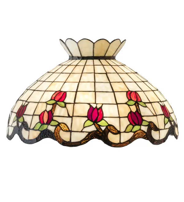 Grace your home or commercial setting with the elegant Roseborder shade. This exquisitely crowned shade features a gridwork of Beige art glass adorned with a Plum Waterglass border of swirling ribbons and perfect Red Rosebuds with Green Leaf accents. The art glass shade is made of hand cut glass using the famous Meyda Tiffany copperfoil construction process. The lovely shade can be paired with a base to create a stunning table or floor lamp or matched with hardware to create a beautiful ceiling fixture. Each shade is a unique work of art with color variations based on natural ingredients inherent in the glass. Contact us if color matching is critical when ordering multiple items. Collection: Roseborder Glass: Ba Br 59 Xag Width: 20.00" Height: 11.50" Length: 20.00" Weight: 7.00 lb Country of Origin: CHINA Safety Listing: Dry Safety Rating: Dry