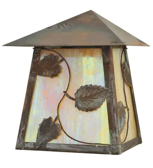 Inspired by Nature; this charming wall sconce features a stunning Vintage Copper Vine and Leaf design that accents the Beige Iridescent Glass lens to evoke a subtle; yet dramatic shadow effect when illuminated. This Craftsman Signature Wall Sconce is perfect for indoor and outdoor lighting applications. Domestically manufactured in our 180;000 square foot facility in Yorkville; New York. The Build Your Own Series can be custom configured with lantern colors; metal finishes; profiles and fixture sizes to suit your taste. UL and cUL listed for dry; damp and wet locations.