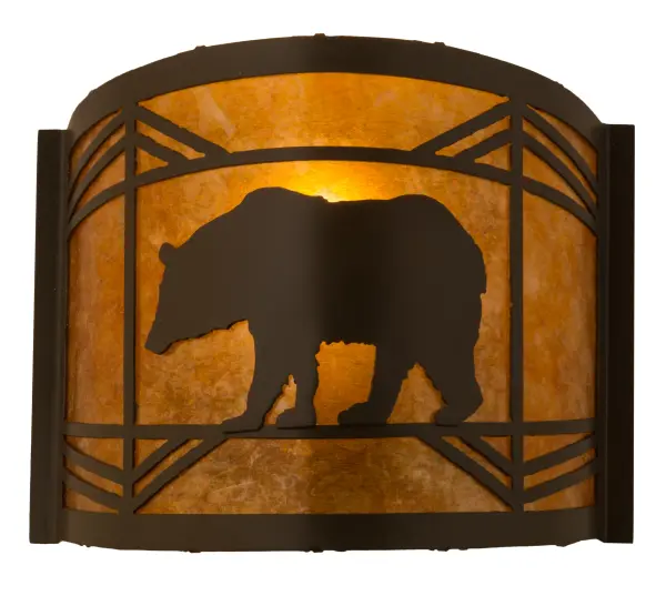 Drawing inspiration from the wildlife and natural beauty in the spectacular American mountain ranges- from New York's Adirondacks; to Big Bend National Park in Texas; to Mount Ranier in Washington. This stunning wall fixture depicts a bold Bear meandering through the woodlands. An Amber Mica shade features a Timeless Bronze finish and will bring the splendor of wildlife into your home. Ideal for illuminating walls in corridors and dining areas in residential and hospitality settings. The Lone Bear Wall Sconce is included in our American-made; American-designed; handcrafted Wildlife Collection and manufactured in Yorkville; New York. UL and cUL listed for dry and damp locations.