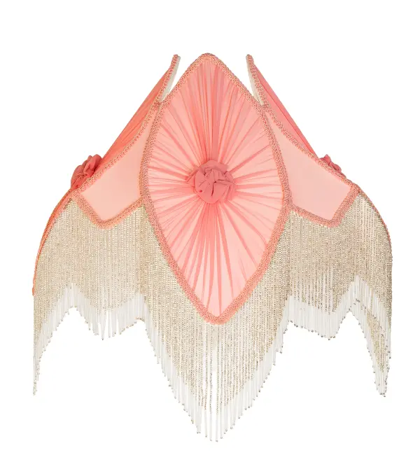 Pink pleated fabrics with floral accents are edged in Clear and Ivory Glass beaded trim. This Victorian-inspired; intricately detailed shade can be paired with a base to create a table or floor lamp; or matched with hardware to produce a ceiling fixture. Ideal as a lighted accent piece on a living room end table; dining room credenza; or bedroom nightstand. Inspired by beautiful fabrics and fashion from New York; to Chicago; Illinois; to Los Angeles; California. The Pink Fabric & Fringe Pink Shade is featured in our American-made; handcrafted Fabric & Fringe Collection.