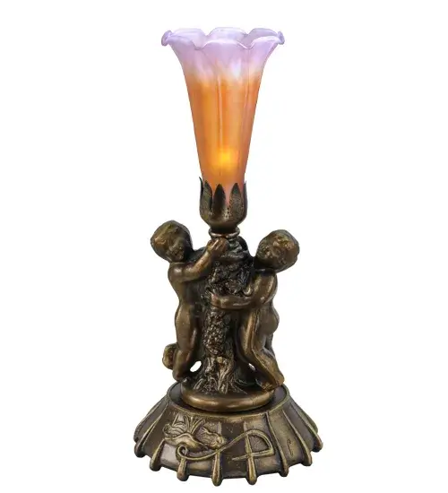 Inspired by the famous Tiffany design from the early 1900s. This mini lamp features a stunning Amber and Purple art glass shade that is embraced by an elegant cast base featuring two cherubs finished by hand in Antique Brass. The Pond Lily Mini Lamp is featured in our American designed; handcrafted Favrile Glass Lighting Collection. UL and cUL listed for dry locations. Each shade is a unique work of art with color variations based on natural ingredients inherent in the glass. Contact us if color matching is critical when ordering multiple items.