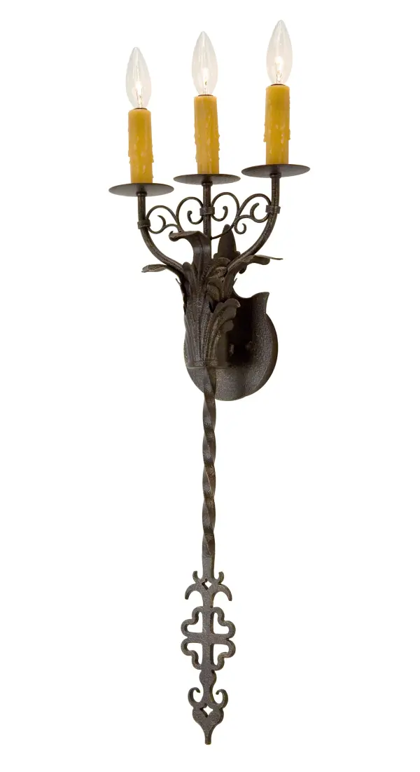 Expert craftsmanship comes to light with handsome distinction in a stunning wall sconce design that entices all to see. 3 Ivory faux candlelights perched on round bobeches are enhanced with scrolled and acanthus leaf accents, and a frame featured in Copper Rust finish and augmented by Gothic traits. The ADA Compliant sconce is custom crafted in the USA. Custom styles, designs, colors and other lamping options such as LED are available. The 30-inch tall fixture is UL and cUL listed for damp and dry locations. Collection: Merano Finish: Copper Rust Width: 11.00" Height: 30.00" Length: 4.00" Weight: 9.00 lb Extension from Wall: 4.00" Number of Bulbs: 3 Maximum Wattage: 60.00 W Bulb Type: BA9 Bulb Base: E12 Material: Steel Country of Origin: USA Safety Listing: Dry Safety Rating: Damp