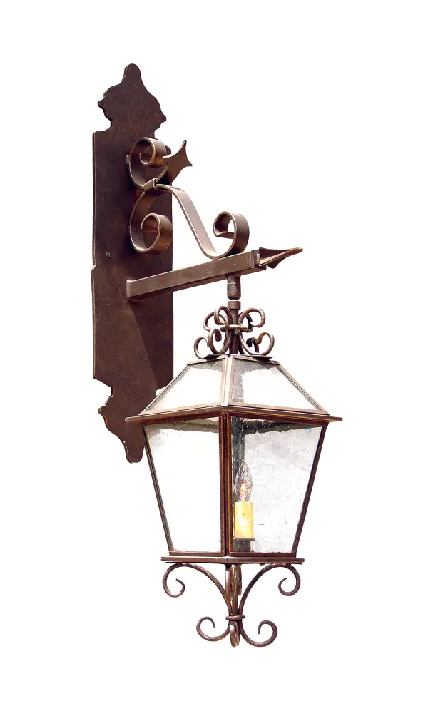 Stately charm and sophistication come to light in a distinctive style. Enjoy the time-honored look of Palermo, an authentic lantern design with classic styling and handcrafted construction. Ideal for indoor and outdoor applications, this shapely lantern features Clear Seeded Glass, which is complemented with a frame, scroll accents, and hardware in a handsome Coffee Bean finish. The sconce is available in custom colors, designs, sizes and dimmable energy efficient lamping options such as LED. The 40-inch tall fixture is UL and cUL listed for dry, damp and wet locations. Collection: Palermo Finish: Coffee Bean Glass: Clear Seeded Glass Width: 11.00" Height: 40.00" Length: 15.00" Weight: 30.00 lb Extension from Wall: 15.00" Number of Bulbs: 2 Maximum Wattage: 60.00 W Bulb Type: B10 Bulb Base: E12 Material: Steel Country of Origin: USA Safety Listing: Wet Safety Rating: Wet