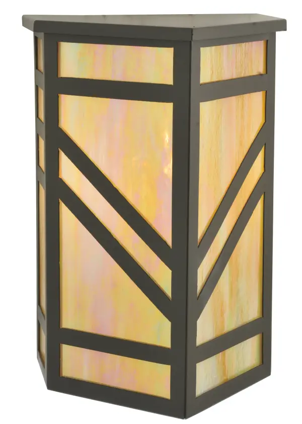 A striking southwestern Mission styled design is featured on the stunning Santa Fe wall sconce. A Beige Iridescent art glass diffuser is combined with bold geometric styling, as well as a frame and hardware in a Timeless Bronze finish. This wall fixture is ideal for ambient decorative lighting in a corridor or any room where you want to make a bold design statement. Handmade in the USA, this sconce is available in custom designs, colors and sizes, as well as with dimmable energy efficient lamping such as LED. The fixture is UL and cUL listed for damp and dry locations. Collection: Santa Fe Finish: Timeless Bronze Glass: Beige Iridescent Glass Notes: Custom Crafted In Yorkville, New York Please Allow 30 Days Width: 11.25" Height: 16.75" Length: 10.25" Weight: 12.00 lb Extension from Wall: 10.25" Number of Bulbs: 1 Maximum Wattage: 60.00 W Bulb Type: A19 Bulb Base: E26 Material: Steel Country of Origin: USA Safety Listing: Damp Safety Rating: Damp