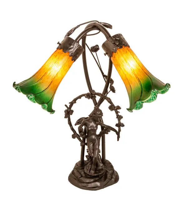 Inspired by the famous Tiffany design from the early 1900s. This table lamp features two stunning shades mouth blown of fine Amber and Green art glass. The Pond Lily shades are embraced by an elegant cast metal base featuring a girl sitting under a trellis that is finished by hand in Mahogany Bronze. The Pond Lily Table Lamp is featured in our American designed; handcrafted Favrile Glass Collection. UL and cUL listed for dry locations. Each shade is a unique work of art with color variations based on natural ingredients inherent in the glass. Contact us if color matching is critical when ordering multiple items.