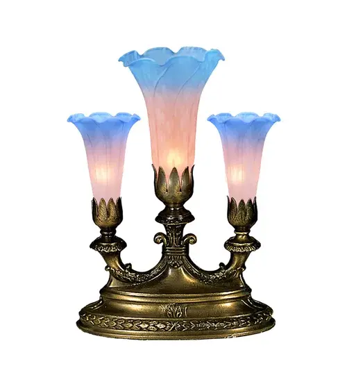 One of the most popular Louis Comfort Tiffany styled lamps on the market today; recreating his famous Favrile design from the early 1900's. This mottled Indigo Blue tipped Pink shaded Three Light Mantelabra offers an attractive; delicate design featuring shades mouth blown of fine art glass. Lily shades are seated in an elegant base finished by hand in Mahogany Bronze.