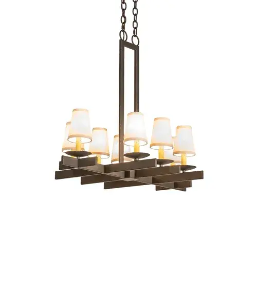 Expert craftsmanship and a distinctive elegance come to light with a luxurious chandelier that entices all to see. 8 Ivory Textrene Shades crown candle covers with Customer supplied Candelabra lamps and handpainted in a Gilded Tobacco finish to match the sturdy frame and hardware. The oblong ceiling fixture is perfect for illuminating bars; islands; counters and dining tables; and is custom crafted in the USA by highly skilled artisans. Custom styles; designs; colors and dimmable energy efficient lamping options such as LED are available. The 36-inch wide fixture is UL and cUL listed for damp and dry locations; however we do not recommend installing it in spaces that experience a large amount of moisture. - alternate view