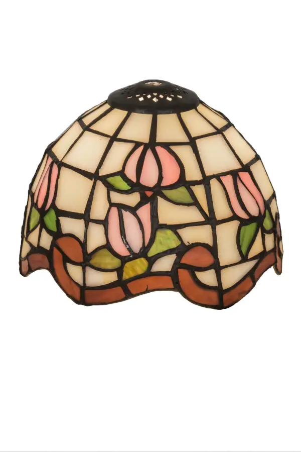 Grace your home with this elegant Roseborder shade. This exquisite shade features a gridwork of Beige art glass adorned with a Plum Waterglass border of swirling ribbons and perfect Pink Rosebuds with Green Leaf accents. The lovely shade can be paired with a base to create a stunning table lamp or matched with hardware to create a beautiful ceiling fixture. The art glass shade is made of hand cut glass using the famous Meyda Tiffany copperfoil construction process to withstand the test of time as an heirloom quality piece in a residential or commercial location. Each shade is a unique work of art with color variations based on natural ingredients inherent in the glass. Contact us if color matching is critical when ordering multiple items.