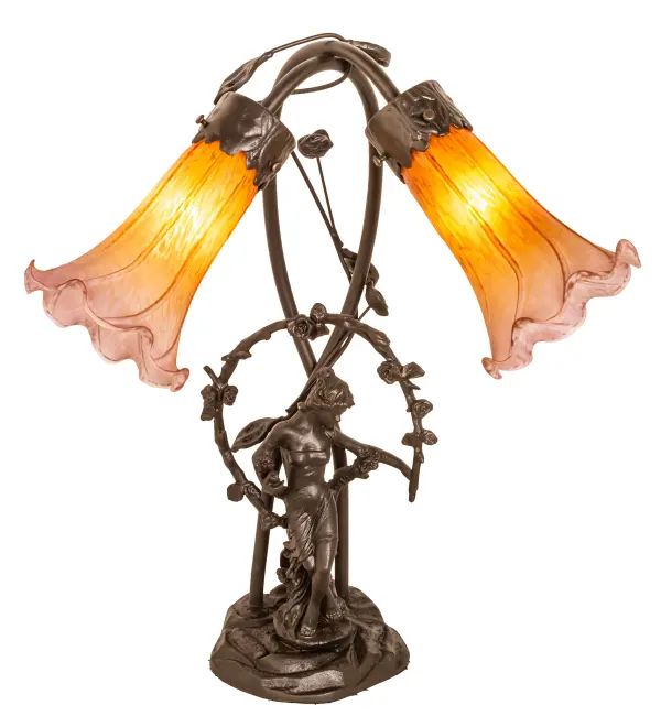 Inspired by Tiffany's famous Pond Lily design from the early 1900s... This table lamp is created with two mouth blown shades featuring Amber and Purple art glass. The Pond Lily shades are embraced by an elegant Cast Bronze Base featuring a girl under a trellis and finished in a rich Mahogany patina. The Pond Lily Table Lamp is featured in our American designed; handcrafted Favrile Lighting Collection. UL and cUL listed for dry locations. Each shade is a unique work of art with color variations based on natural ingredients inherent in the glass. Contact us if color matching is critical when ordering multiple items.