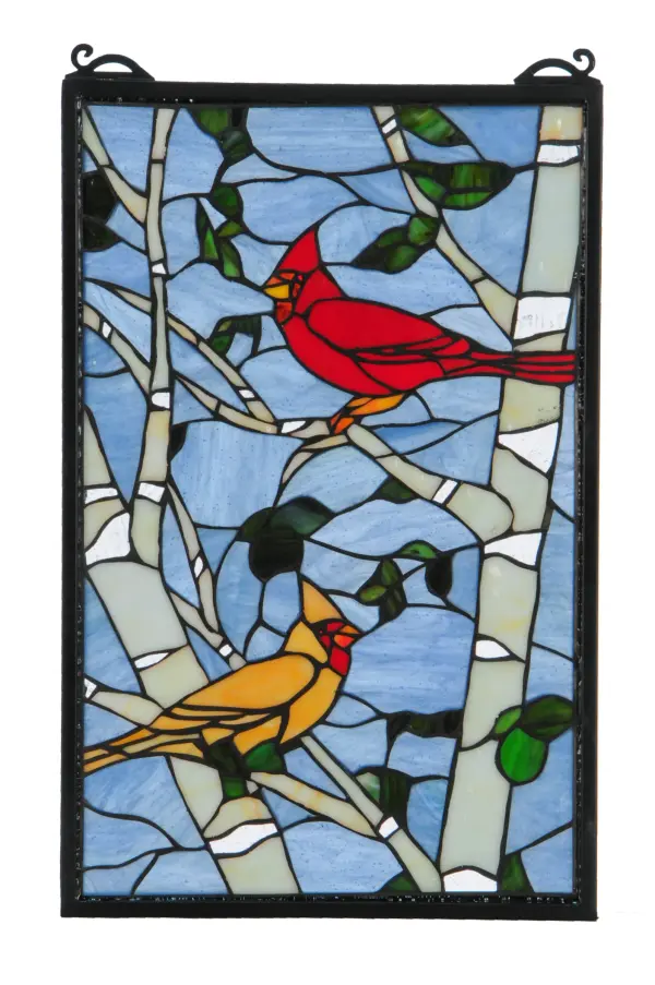 A stunning natural setting features brilliant American Cardinals in Bright Red and Light Brown plumage while perched on Winter Gray; Bone Beige; White and Clear Ripple branches and Green leaves; on a Blue/Gray background; with all of their beautiful splendor. The stained glass window is created with delicate pieces of authentic stained glass using Meyda Tiffany's famous copperfoil construction process and complemented with a frame finished in Black. Hanging chains are included.