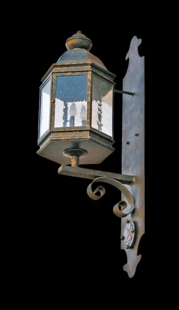 European charm comes alive with the Elemental Lantern Wall Sconce which features a Grandiose 44-inch height to make an impressive design statement for any fine exteriors and interiors. A stunning Golden Bronze finish is displayed on the hardware, accents and frame which feature a Clear Seeded Glass Lens that reveals 3 complementary faux candlelights. Handmade in the USA. Custom options include dimmable energy efficient lamps, as well as special sizes, finishes and designs. UL and cUL listed for dry, damp and wet locations. Collection: Elemental Finish: Golden Bronze Glass: Clear Seeded Glass Width: 13.00" Height: 44.00" Length: 17.00" Weight: 51.00 lb Extension from Wall: 17.00" Number of Bulbs: 3 Maximum Wattage: 60.00 W Bulb Type: B10 Bulb Base: E12 Material: Steel Country of Origin: USA Safety Listing: Wet Safety Rating: Wet