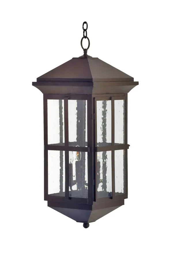 A sophisticated architecturally styled fixture is designed with a pizazz that is unique; fresh and stylish. Give your decor an extra edge with this breathtaking ceiling fixture; which is highlighted with a solid metal structure featuring Clear Seeded Glass that reveals 3 stylized Gilded Tobacco finished Candle Covers with Customer Supplied Candelabra Lamps. The hardware and frame are also featured in a matching Gilded Tobacco finish. Handcrafted in the USA; Myles is available in custom sizes; styles and finishes; as well as dimmable energy efficient lamping options such as LED. The 14-inch wide ceiling pendant is UL and CUL listed for damp and dry locations.