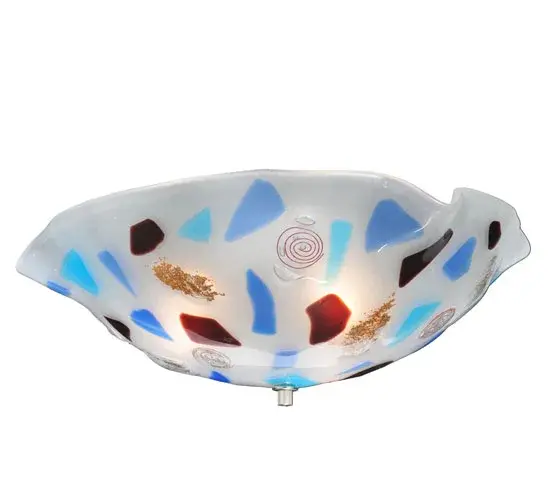 A celebration of beautiful light. The Atelier Festival ceiling fixture features vibrant colored pieces of art glass fused together. The art glass is high-fired to create a unique; organic shape. An elegant Wrinkle-styled shade results from high-fired art glass accents in Light Blue; Electra Blue; Gold Dust; and Cranberry on a White glass background. The ceiling fixture is the perfect centerpiece on the ceiling or wall of nearly any room. It is a true work of art. Ideal for homes; modern restaurants; and those that appreciate a work of beauty. Traditional workmanship; high-fire kilns; and original tools are used to fuse art glass in the old world tradition and inspired by modern homes from Westchester County; New York; to Highland Park; Chicago; Illinois; to Northern California. The Atelier Festival Flushmount is featured in our American-made; American-designed; handcrafted Fused Glass Lighting Collection. UL and cUL listed for dry and damp locations. Each shade is a unique work of art with color variations based on natural ingredients inherent in the glass. Please contact us if color matching is critical when ordering multiple items. - alternate view