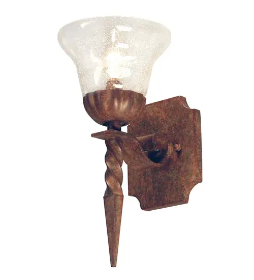 Elegance and grace come to light beautifully in this torch inspired wall sconce. Odessa features a Clear Seeded Glass shade perched on a shapely bobeche enhanced with a Gothic spear-like finial. The frame and hardware are featured in an Organic Rust finish. Custom crafted by highly skilled artisans in the USA, this wall fixture is available in custom sizes, styles and shapes. Dimmable energy efficient lamping options are offered. The 12-inch tall sconce is UL and cUL listed for dry and damp locations. Collection: Odessa Finish: Organic Rust Glass: Clear Seeded Glass Width: 6.00" Height: 12.00" Length: 7.00" Weight: 4.00 lb Extension from Wall: 7.00" Number of Bulbs: 1 Maximum Wattage: 60.00 W Bulb Type: B10 Bulb Base: E12 Material: Steel Country of Origin: USA Safety Listing: Dry Safety Rating: Damp