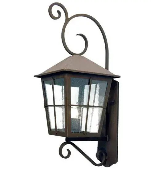 A rich aspirational design can be yours with Fortunato, an appealing exterior and interior lighting design. This stately lantern features large scrolled accents, backplate and tapered frame in a Cajun Spice finish. The hardware is enhanced with a Clear Seeded Glass Lens revealing a single complementary faux candlelight. The 30-inch tall fixture is UL and cUL listed for dry, damp and wet locations. Available in custom sizes, finishes, design and dimmable energy efficient lamping such as LED. Collection: Fortunato Finish: Coffee Bean Glass: Clear Seeded Glass Width: 12.00" Height: 30.00" Length: 15.00" Weight: 31.00 lb Extension from Wall: 15.00" Number of Bulbs: 1 Maximum Wattage: 60.00 W Bulb Type: A19 Bulb Base: E26 Material: Steel/Brass Country of Origin: USA Safety Listing: Dry Safety Rating: Wet