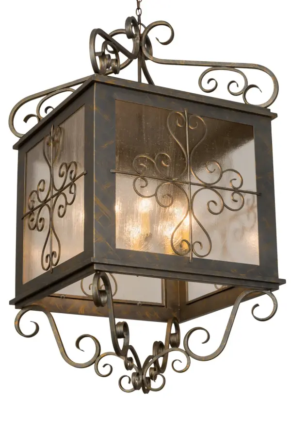 Welcome a handsome revival look into your home or business with this alluring Myra Lantern Pendant, which integrates a distinctive scrolled cross-like motif with fanciful scrolled accents. The cube shaped diffuser features Clear Seeded Glass which reveals an 8 light candelabra featuring Amber faux candlelights and is enhanced with a frame and hardware featured in a French Bronze finish, This handforged steel fixture completes an evocative impression with a compelling design and beautiful ambient illumination. Custom crafted in Yorkville, New York by highly skilled artisans, this fixture is available in custom finishes, sizes and colors, as well as dimmable energy efficient lamping options such as LED. The pendant is UL and cUL listed for damp and dry locations. Collection: Myra Finish: French Bronze Glass: Clear Seeded Glass Width: 48.00" Height: 73.00" Length: 34.00" Weight: 145.00 lb Number of Bulbs: 8 Maximum Wattage: 60.00 W Bulb Type: BA9 Bulb Base: Candelabra Material: Steel Country of Origin: USA Safety Listing: Damp Safety Rating: Damp