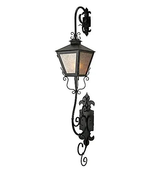 Catalonia reveals a shapely profile and a stylish elegance. The Silver Mica lens is enhanced with Coffee Bean finished Fleur-de-Lis accents, scrollwork and hardware. This steel constructed lantern projects beautiful ambient illumination for both interior and exterior applications. The wall luminaire is custom crafted in our 180,000 square foot manufacturing facility Yorkville, New York. Custom styles, designs, and finishes available. UL and cUL listed for dry, damp and wet locations. Collection: Catalonia Finish: Coffee Bean Glass: Silver Mica Width: 12.00" Height: 66.00" Length: 12.00" Weight: 42.00 lb Extension from Wall: 12.00" Number of Bulbs: 1 Maximum Wattage: 60.00 W Bulb Type: A19 Bulb Base: E26 Material: Steel Country of Origin: USA Safety Listing: Dry Safety Rating: Damp