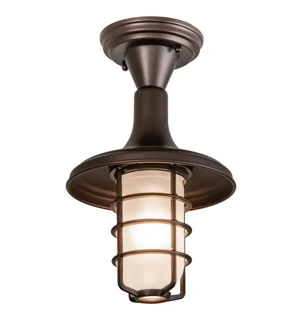 An industrial styled single light fixture with lamp guard is designed for residential and restaurant applications. The hardware are hand finished in a handsome Mahogany Bronze and the shade is crafted of Sandblasted Frosted Clear glass. Custom sizes; styles and colors available. The fixture is handcrafted by Meyda artisans at the company's manufacturing facilities in Upstate New York
