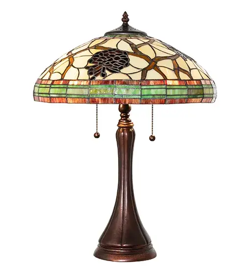 This stunning art glass design features the iconic Pinecone; one of Mother Nature's most compelling organic symbols; which offers natural elegance and represents the evolution of human enlightenment. Burgundy and Leaf Green bands edge this woodland shade; highlighting Light Brown pinecones and Golden Sun branches on a Beige art glass shade. The beautiful shade is created using the famous Meyda Tiffany copperfoil construction technique and complemented with a Mahogany Bronze finished base. Inspired by Pine Trees in renowned American forests; including Deschutes National Forest in central Oregon; Sierra National Forest in the Nevada-Sierra National Forest; and the White Mountain Forest; New Hampshire. The Pinecone Mission Mini Lamp is included in our American-designed; handcrafted Nature Inspired Stained Glass Collection. UL and cUL listed for dry locations. - alternate view