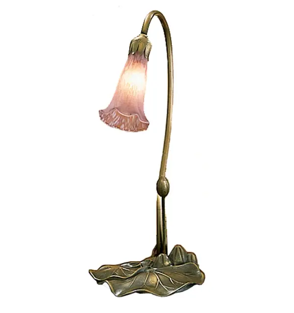One of the most popular Louis Comfort Tiffany style lamps on the market today... This Pond Lily offers an attractive, delicate design featuring a shade mouth blown of fine Lavender art glass and embraced by a stem and Lily pad base finished by hand in Mahogany Bronze. The Pond Lily Mini Lamp is included in our American designed, handcrafted Favrile Glass Lighting Collection. UL and cUL listed for dry locations. Each shade is a unique work of art with color variations based on natural ingredients inherent in the glass. Contact us if color matching is critical when ordering multiple items. Collection: Lavender Finish: Mahogany Bronze Glass: Lavender Width: 7.00" Height: 16.00" Length: 7.00" Weight: 2.50 lb Extension from Wall: 7.00" Number of Bulbs: 1 Maximum Wattage: 40.00 W Bulb Type: B10 Bulb Base: E12 Light Source: LED Color Temperature: 6000 K Material: Metal Country of Origin: CHINA Safety Listing: Dry Safety Rating: Dry LED