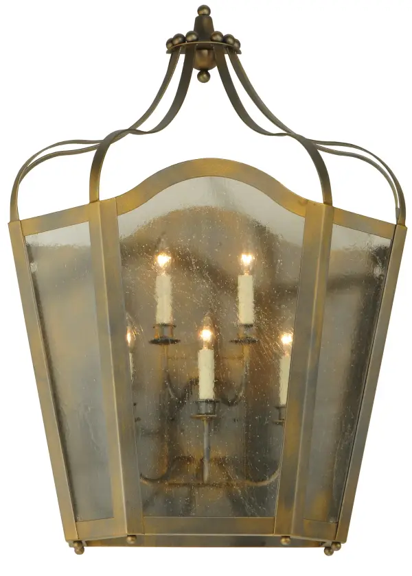 Utilizing a blend of timeless craftsmanship and classic design, the ever-popular Citadel brings home unsurpassed quality and shapely appeal. Evoking a dramatic effect, beautiful ambient light is projected through a Clear Seeded Glass lens which reveals 5 Amber faux candlelights featured within this pendant. Citadel is enhanced with a curvaceous frame and hardware featured in a French Bronze finish. The wall sconce is handcrafted by skilled artisans in our 180,000 square foot manufacturing facility in Yorkville, NY. Custom options include various sizes, colors, designs and dimmable energy efficient lamping. The decorative wall fixture is UL and cUL listed for dry and damp locations. Collection: Citadel Finish: French Bronze Glass: Clear Seeded Glass Width: 25.25" Height: 36.00" Length: 12.00" Weight: 31.00 lb Extension from Wall: 12.00" Number of Bulbs: 5 Maximum Wattage: 40.00 W Bulb Type: B10 Bulb Base: E12 Material: Steel Country of Origin: USA Safety Listing: Damp Safety Rating: Damp