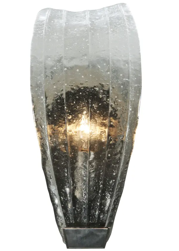 The beautiful Crystal Clear Art Glass shade features a Raindrop texture and is enhanced with Brushed Stainless Steel hardware-- a pleasant retreat from the ordinary. Ideal for modern homes and restaurants and those that appreciate a work of beauty. Traditional artistry; high-fire kilns; and original tools fuse art glass in the old world tradition. Ideal for installation in hallways; dining areas; and living spaces in residential and hospitality locations from Portland; Maine; to St. Petersburg; Florida; to Cupertino; California. The Metro Fusion Crystal Clear Glass Wall Sconce is featured in our American-made; American-designed; handcrafted Fused Glass Lighting Collection and manufactured in Yorkville; New York. UL and cUL listed for dry and damp locations. Each shade is a unique work of art with color variations based on natural ingredients inherent in the glass. Please let us know if color matching is critical when ordering multiple items.