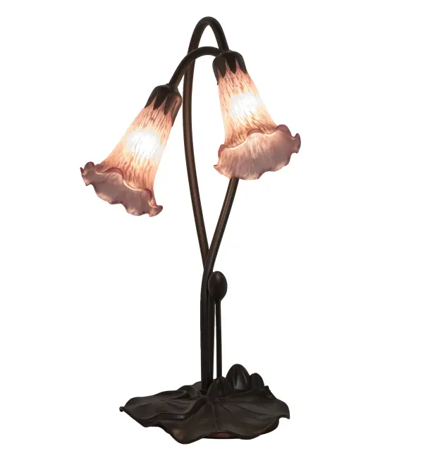 One of the most popular Louis Comfort Tiffany styled lamps on the market today; recreating his famous Favrile design from the early 1900's. This softly mottled Lavender fluted shaded Two Light Accent Lamp offers an attractive; delicate design featuring shades mouth blown of fine art glass. Lily shades are suspended from stems delicately winding above Lily pads bases finished by hand in Mahogany Bronze.