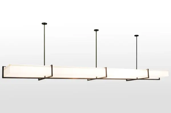 Rendering a clean transitional look. This extensive lighting design features a Statuario Idalight shade embraced by a Natural Steel structural frame and hardware. The oblong pendant is enhanced with a Natural Steel finish. The Quadrato Brew Oblong Pendant is included in our American-made; American-designed; handcrafted Modern Lighting Collection. Manufactured in Yorkville; NY. UL and cUL listed for dry and damp locations. Featured in the Stone Brewing World Bistro & Gardens in San Diego.