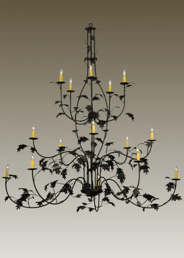 Oak Leaves appear to dance joyfully among the light. Rustic charm is revealed with this nature inspired chandelier as Mahogany Bronze finished Oak leaves flourish from branch-like arms that adorn 15 Ivory faux candlelights. This grand scaled chandelier is perfect for larger spaces but also provides a whimsical and delicate; open and airy design aesthetic. The overall height ranges from 73 to 216 inches as the chain length can be easily adjusted in the field to accommodate your specific lighting application needs. Made to Order in our 180;000 square foot manufacturing facility in Yorkville; New York at the foothills of the breathtaking Adirondack Mountains. Candlelight colors; metal finishes and chandelier sizes can be customized to your needs. UL and cUL listed for dry and damp locations.