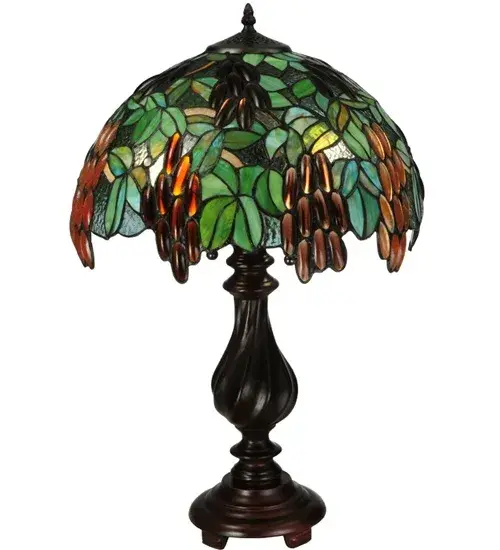 Italian for Merlot, "Murlo" was inspired by vintage wine and luscious grapes. Bunches of Concord Purple, Amber, Sunset Swirled jeweled glass grapes grow and ripen on Green with Yellow and Sunburst colored vines, against a Multicolored background with Clear glass jewel accents. This stunning shade was created using Meyda Tiffany's famous copperfoil construction and complemented with a graceful Mahogany Bronze finished base. Collection: Murlo Finish: Mahogany Bronze Glass: Green Nut Brown Width: 16.00" Height: 25.00" Length: 16.00" Weight: 12.00 lb Number of Bulbs: 2 Maximum Wattage: 60.00 W Bulb Type: A19 Bulb Base: E26 Material: Zinc Country of Origin: CHINA Safety Listing: Dry Safety Rating: Dry