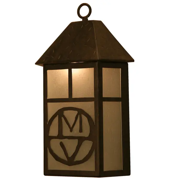 A sophisticated wall luminaire; this Custom Interior/Exterior Sconce infuses an intriguing style with a straight line design; frame and matching hardware featured in a hand-applied Gilded Tobacco finish. The lantern is designed with personalized monograms on a luminescent Frosted Clear Seeded Glass. Handcrafted in Yorkville; New York; this fixture is UL and cUL listed for dry; damp and wet locations. Personalized items are shown as examples of our craftsmanship only and not for sale as is; but can be customized to fit your personal needs.