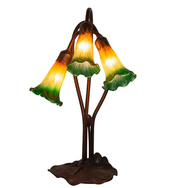 One of the most popular Louis Comfort Tiffany styled lamps on the market today; recreating his famous Favrile design from the early 1900's. offers an attractive; delicate design featuring shades mouth blown of fine art glass. Lily shades are suspended from stems delicately winding above a Lily pad base finished by hand in Mahogany Bronze.