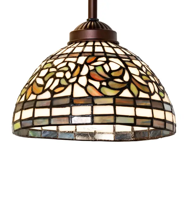 Autumn Gold, Russet, and Moss Green leaves swirl against an Amber Mauve background, enhanced with bands of Purple, Blue, and Green. The charming shade is created using the famous Meyda Tiffany copperfoil construction and complemented with elegant cast metal hardware in Mahogany Bronze. The overall height can be adjusted by combining the four stem lengths that are included: 6-inch, 12-inch, 16-inch, and 24-inch, in any combination to achieve the desired drop from the ceiling. The Tiffany Turning Leaf Mini Pendant is featured in our American-designed, handcrafted Tiffany Reproduction Collection and can be installed in a row over an island, bar, counter, or table to make an impressive statement. UL and cUL listed for dry and damp locations. Each shade is a unique work of art, featuring color variations derived from the natural ingredients inherent in the glass. Collection: Tiffany Turning Leaf Finish: Mahogany Bronze Glass: Stained Glass Width: 8.00" Height: 15.00" Length: 8.00" Weight: 2.50 lb Number of Bulbs: 1 Maximum Wattage: 60.00 W Bulb Type: A19 Bulb Base: E26 Material: Steel Country of Origin: CHINA Safety Rating: Damp