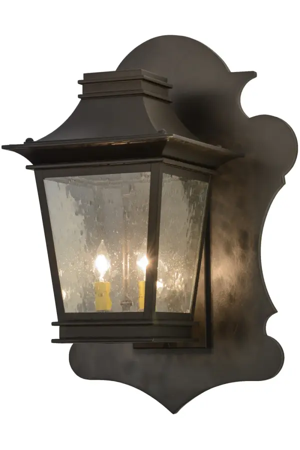 A classic indoor/outdoor wall lantern design featured with an impressive decorative backplate. The handsome detailed fixture body is featured in a Timeless Bronze finish. The Clear Seeded Glass lens reveals two Ivory faux candlelights that provide beautiful ambient light. The Fanucchi Lantern Wall Sconce is Domestically produced in our 180,000 square foot manufacturing facility in Yorkville, New York. Diffuser colors, metal finishes and fixture sizes can be customized to your needs. UL and cUL listed for dry, damp and wet locations. Collection: Fanucchi Finish: Timeless Bronze Glass: Clear Seeded Glass Width: 18.00" Height: 26.00" Length: 14.00" Weight: 11.00 lb Extension from Wall: 14.00" Number of Bulbs: 2 Maximum Wattage: 60.00 W Bulb Type: B10 Bulb Base: E12 Material: Brass Country of Origin: USA Safety Listing: Damp Safety Rating: Wet