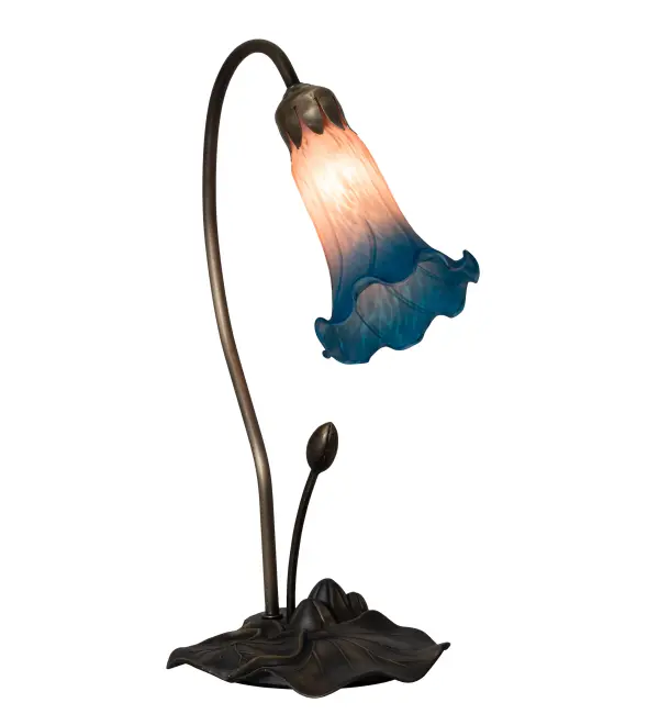 One of the most popular Louis Comfort Tiffany styled lamps on the market today. This Pond Lily accent lamp recreates the famous Favrile design from the early 1900s. The Pink/Blue shade features a flowering Lily created from fine mouth blown art glass. The shade is embraced by a delicate metal stem attached to a charming Lily pad base hand finished in Mahogany Bronze. UL and cUL listed for dry locations.