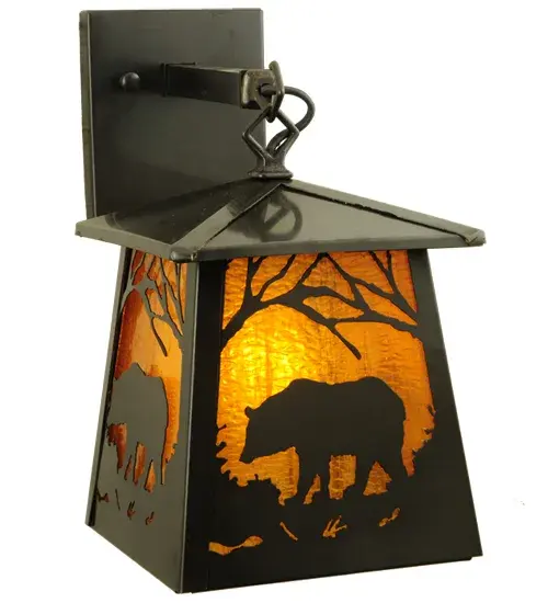 Crafted of Solid Brass; this wall sconce features a majestic Bear roaming through the woodlands. Beautiful ambient light shines through the Honey Amber Art Glass lens while the fixture is enhanced with accents and hardware featured in a Craftsman Brown finish. This outdoor wall sconce can be installed on exterior walls and facades in residential; hospitality; and commercial spaces. The Stillwater Grizzly Bear Wall Sconce is featured in our American-made; American-designed; handcrafted Craftsman Signature Series. This fixture is manufactured in Yorkville; New York. It is UL and cUL listed for dry and damp locations. Our Build Your Own Craftsman Signature Series features unlimited combinations of styles. The collection is called Build Your Own because it is fully configurable and customizable from size and design to finish and lens color. Marine grade; solid brass; or copper raw materials are utilized to ensure items from the Craftsman Signature Series of outdoor and indoor lighting will stand the test of time; as these premium metals are impervious to most types of oxidation. Hand-applied Patina finishes on brass and copper are sealed with a clear varnish and over time; may require gentle maintenance; such as wax; to delay or reverse the natural living finish attributes indicative of this finishing process. Patina finishes on brass and copper provide strong resistance to fading from sun exposure; will not chip or crack; and will not rust like a steel-framed item in the same conditions. Choose from many style options; or send us your concept today! Call today to learn how to use the configuration tool available on our website for an instant item number! - alternate view