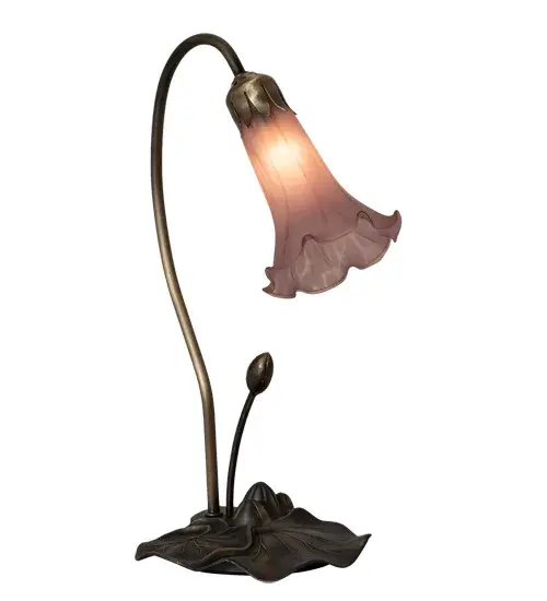 One of the most popular Louis Comfort Tiffany styled lamps on the market today. This Pond Lily accent lamp recreates the famous Favrile design from the early 1900s. The Lavender shade features a flowering Lily created from fine mouth blown art glass. The shade is embraced by a delicate metal stem attached to a charming Lily pad base hand finished in Mahogany Bronze. UL and cUL listed for dry locations. Collection: Lavender Finish: Mahogany Bronze Glass: Lavender Width: 10.00" Height: 16.00" Length: 6.50" Weight: 2.00 lb Number of Bulbs: 1 Maximum Wattage: 60.00 W Bulb Type: BA9 Bulb Base: E12 Material: Steel Country of Origin: CHINA Safety Listing: Damp Safety Rating: Dry