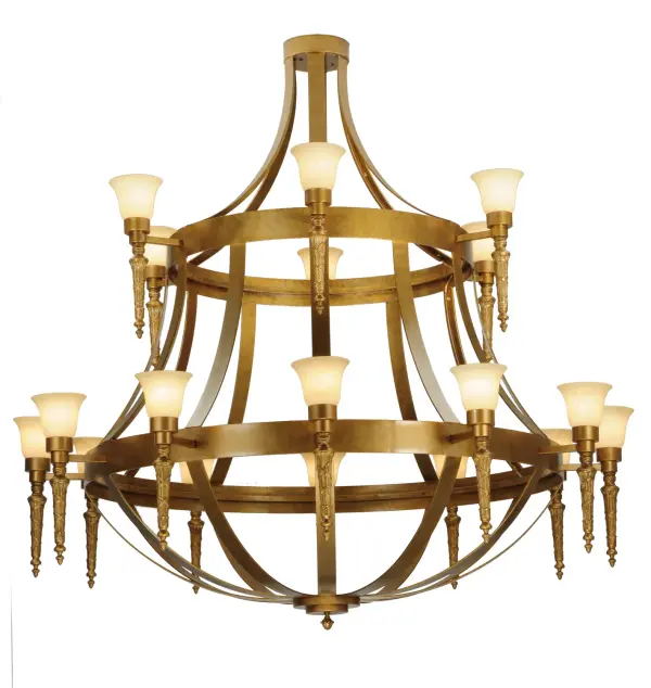 An exquisite, elaborate centerpiece for large spaces, this massive chandelier features eighteen graceful Scavo glass shades adorning the two decorative rings. The two tiers feature Gilded Gold-finished decorative accents and hardware. The elegant chandelier provides beautiful ambient lighting for great rooms and entryways in residential, commercial, and hospitality settings. The Lubovich 18 Light Two Tier Chandelier is included in our American-made, American-designed, handcrafted Gothic Collection and manufactured in Yorkville, NY. It is UL & cUL listed for dry and damp locations. Collection: Lubovich Finish: Gilded Gold Ii Glass: Scavo Glass Width: 72.00" Height: 76.00" Length: 72.00" Weight: 230.00 lb Extension from Wall: 5.00" Number of Bulbs: 18 Maximum Wattage: 60.00 W Bulb Type: A19 Bulb Base: E26 Material: Steel Country of Origin: USA Safety Listing: Damp Safety Rating: Damp