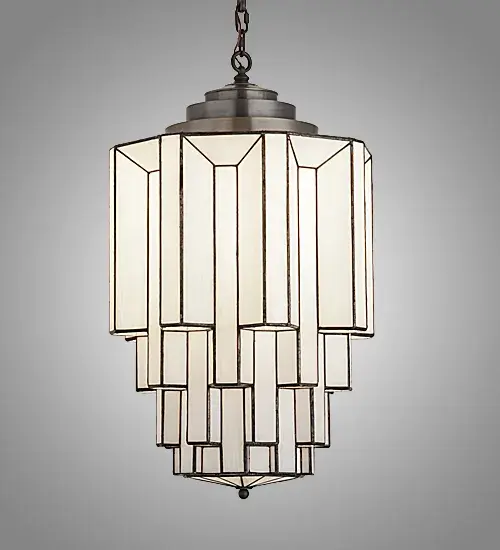 Designed with the glitz and glam of old fashioned movie theaters, Paramount evokes a romantic allusion with a dramatic lighting design that features art glass created using our famous copperfoil construction. Multi layers and levels of enclosed glass cylinders create an extraordinary dimensional effect. A three-step hub, finished in Highlighted Light Craftsman Brown crowns the shade. Handcrafted in the USA, this fixture is offered in custom sizes, styles and colors. UL and cUL listed for dry and damp locations. Collection: Paramount Finish: Light Craftsman Brown W/Highights Glass: White Art Glass Width: 18.00" Height: 34.00" Length: 18.00" Weight: 29.00 lb Number of Bulbs: 1 Maximum Wattage: 12.00 W Bulb Type: A19 Bulb Base: GU24 Light Source: LED Material: Brass Country of Origin: USA Safety Listing: Damp Safety Rating: Damp Energy Efficient LED - alternate view