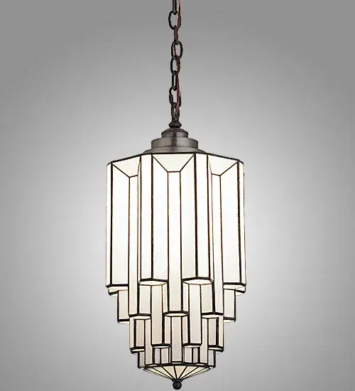 Designed with the glitz and glam of old fashioned movie theaters, Paramount evokes a romantic allusion with a dramatic lighting design that features art glass created using our famous copperfoil construction. Multi layers and levels of enclosed glass cylinders create an extraordinary dimensional effect. A three step hub, finished in Highlighted Light Craftsman Brown crowns the shade. Energy efficient LED lamping supplied by customer. Handcrafted in the USA, this fixture is offered in custom sizes, styles and colors. UL and cUL listed for dry and damp locations. Collection: Paramount Finish: Light Craftsman Brown W/Highlights Glass: White Art Glass Width: 12.00" Height: 28.00" Length: 12.00" Weight: 15.50 lb Extension from Wall: 14.50" Number of Bulbs: 1 Maximum Wattage: 12.00 W Bulb Type: A19 Bulb Base: GU24 Light Source: LED Material: Brass Country of Origin: USA Safety Listing: Damp Safety Rating: Damp Energy Efficient LED - alternate view