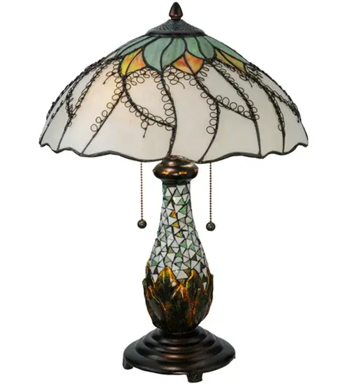 Unique Green and Chartreuse with Persimmonleaves sprout on the crown of this art glass shade featuring Black branches and vines on a Bone Beige background. This unique floral shade is enhanced with an art glass mosaic base in Green; White and Metallic Emerald tilework; which sprouts out of a hand painted metal bud that sits on a Mahogany Bronze base. - alternate view